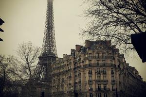 view of Eiffel Tower and a brown-grey building